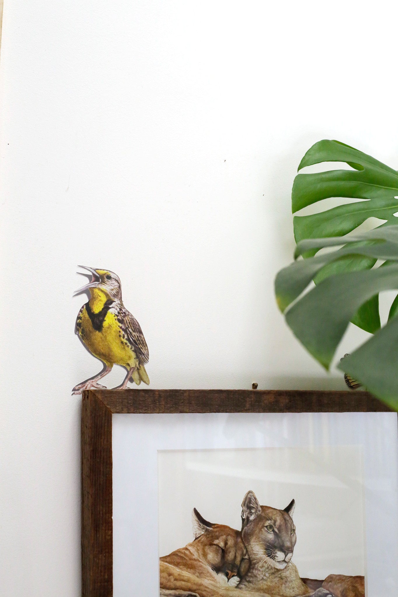 Zoomed out image to show scale of bird with other artwork