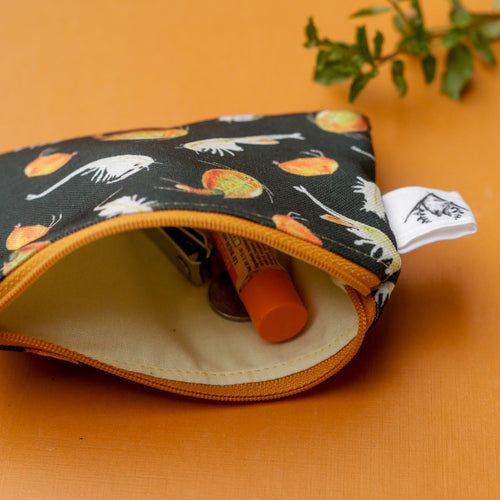 Load image 1 in gallery view. Showing the inside of the pouch with nail clippers and lip balm.