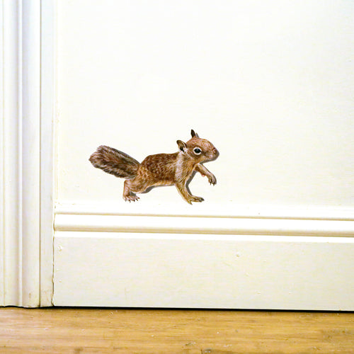 Load image 1 in gallery view. Realistic California Ground Squirrel against white wall just above baseboard.